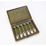 A cased set of Liberty & Co Art Nouveau silver and enamel teaspoons