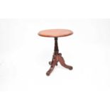 A small inlaid tilt-top occasional table