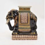 A 20th century Chinese ceramic garden seat in the form of a caparisoned elephant
