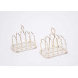 A pair of four division silver toast racks