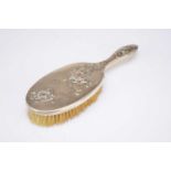 A Chinese silver dressing table brush by Laing Chang