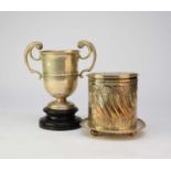 A Victorian silver two handled trophy cup and a plated biscuit barrel