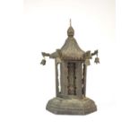 A Tibetan pressed metal prayer wheel