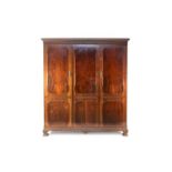 An early 20th century mahogany wardrobe and dressing table