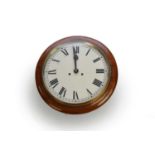A mahogany circular wall clock