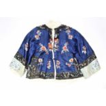 A Chinese embroidered silk winter jacket