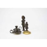 Probably Coalbrookdale, two miniature bronze chambersticks, with a seal and a figure of Napoleon (4)