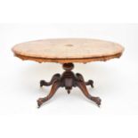 A Victorian figured walnut loo table
