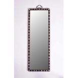 A Chinese rosewood-framed wall mirror