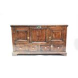 An 18th century oak mule chest