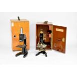 Two 20th century cased student microscopes