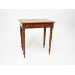 A late Victorian mahogany writing or library table