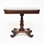 A Mid-Victorian mahogany fold-over tea table