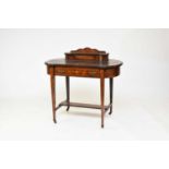 An Edwardian inlaid rosewood writing table