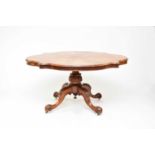 A Victorian walnut veneered loo table