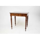 A late Victorian mahogany writing table