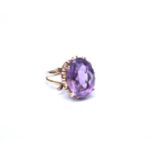 A 9ct gold single stone amethyst ring