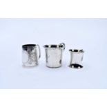 Three silver mugs