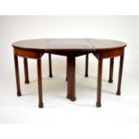 A 19th century mahogany D-end extending dining table