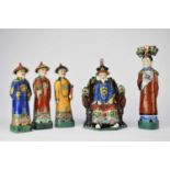 A group of five Chinese porcelain figures of an emperor and attendants