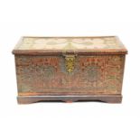 A 20th century Middle-Eastern brass studded and bound hard-wood chest