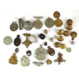 Assorted medals, badges and buttons