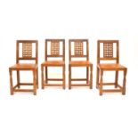 A set of four Old Mill, Thirsk, oak lattice-back dining chairs