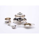 A silver tea caddy, caddy spoon and tea strainer on stand