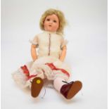 A Heinrich Handwerk bisque-headed doll