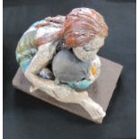 A glazed pottery figure group, in the manner Megan di Girolamo A glazed pottery figure group in the