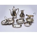 A collection of white metal and silver plated wares