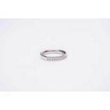 A platinum diamond half eternity ring