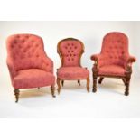 An assembled trio of Victorian mahogany upholstered salon chairs