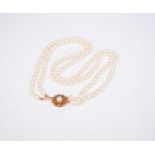 A two strand cultured pearl necklace with 9ct gold cultured pearl set clasp