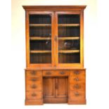 A Victorian oak bookcase-cum-desk