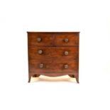 An early Victorian mahogany bow-front chest of drawers