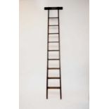 A set of oak library ladders