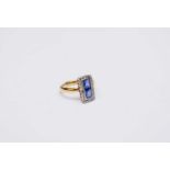 A sapphire and diamond elongated rectangular cluster ring