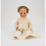 A Maher Bruno Schmidt bisque-headed doll