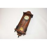 A late 19th century rosewood Vienna wall clock and an oak fusee wall clock