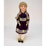 An Armand Marseille bisque headed doll