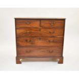 A George III mahogany rectangular chest of drawers