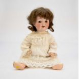 A Strobel & Wilken bisque-headed doll