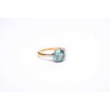 A blue zircon single stone ring