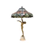 A French art deco bronzed figural lamp