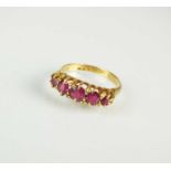 An 18ct gold five stone ruby ring
