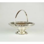 A silver swing handled basket