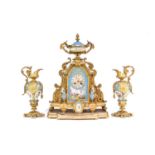 A French ormolu and porcelain clock garniture