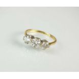 A graduated three stone diamond ring