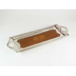 An Edwardian silver mounted inlaid wood tray